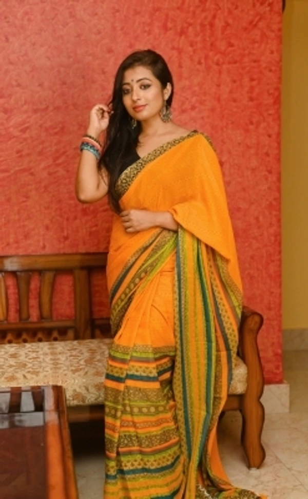 Acb1340 Daily Wear Georgette SareeStyle Code :SP_Giri1_1164_2Pack of :1Secondary Color :YellowOccasion :Party & FestiveConstruction Type :MachineFabric Care :Hand WashFabric :