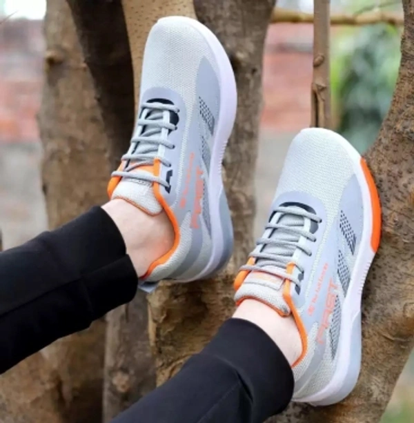 Running Shoes For MenArticle Number :74Brand :CrazylyColor Code :GREYSize in Number :41UK India Size :7color :Grey, WhiteIdeal For :Men7 Days Return Policy, No questions asked. - 7