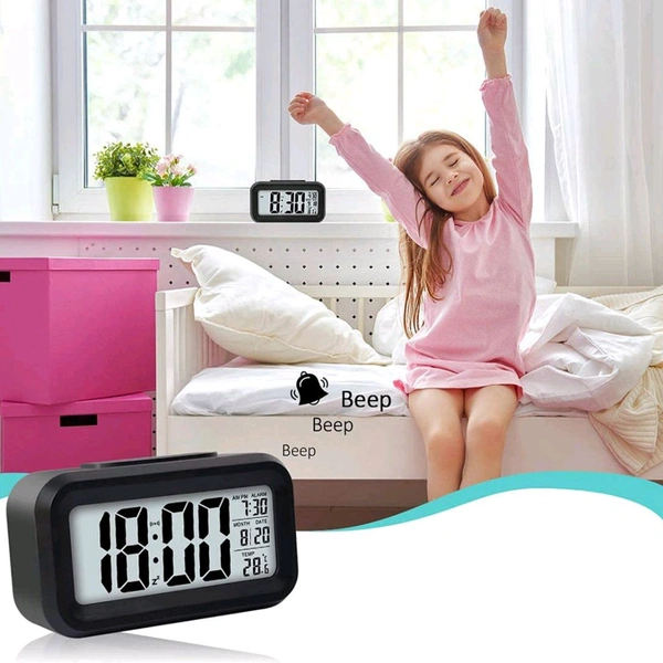 Digital LCD Alarm Clock with Backlight β Optically Controlled Battery-Powered Clock with Time, Date, and Temperature Display