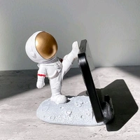 Mobile Holder Astronaut Phone Stand Planet Creative Fun 3D Design Spaceman Phone Holder for Car Dashboard Statue Desktop Ornaments Kicking Leg Status