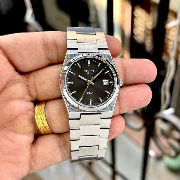 TISSOT PRX – ICONIC SWISS-INSPIRED ELEGANCE - Black