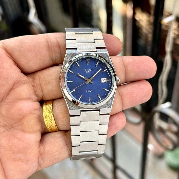 TISSOT PRX – ICONIC SWISS-INSPIRED ELEGANCE - Blue