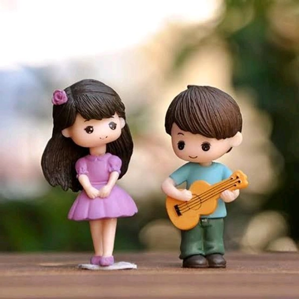 Miniature Guitar Boy With Girl