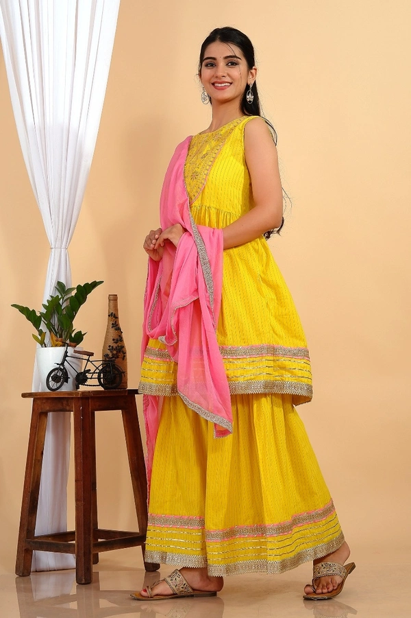 Premium heavy cotton lurex designer tire pattern gown with side slit detailed with heavy gota work all over. - XXL