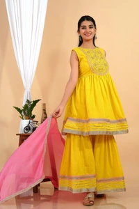 Premium heavy cotton lurex designer tire pattern gown with side slit detailed with heavy gota work all over. - XXL
