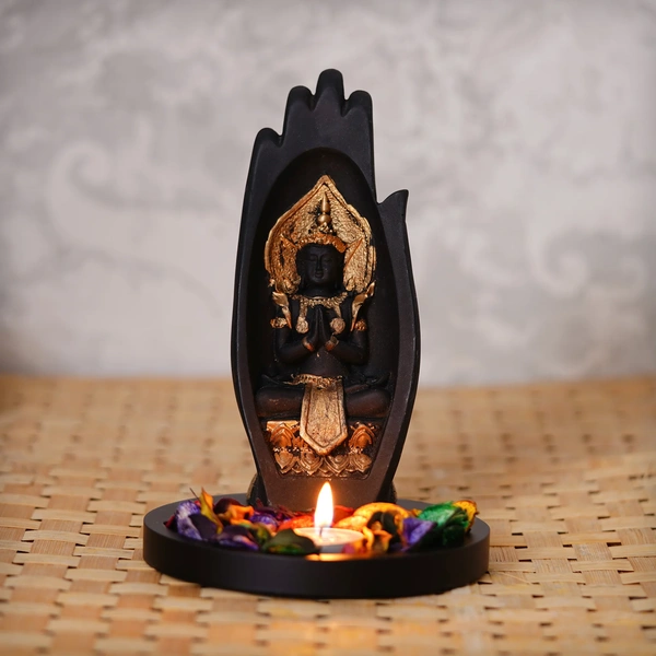 Meditating Buddha Idol Under Palm