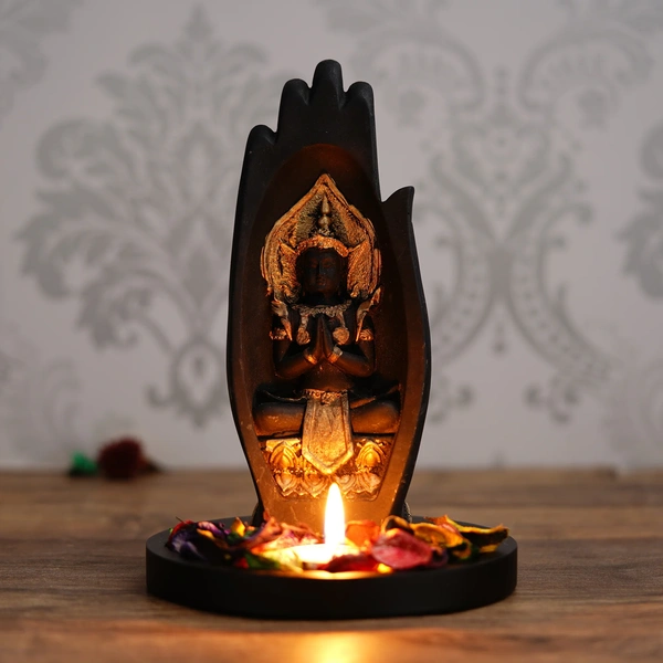 Meditating Buddha Idol Under Palm