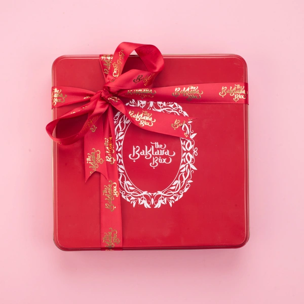 Red Tin Assorted Chocolate Baklava Box With Red Ribbon - 1 Kg