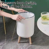 Stylish floor-standing dustbin with modern ribbed design, Plastic legs, and a flip-top lid. Perfect for kitchens, living rooms, and offices, offering functionality with elegant décor.