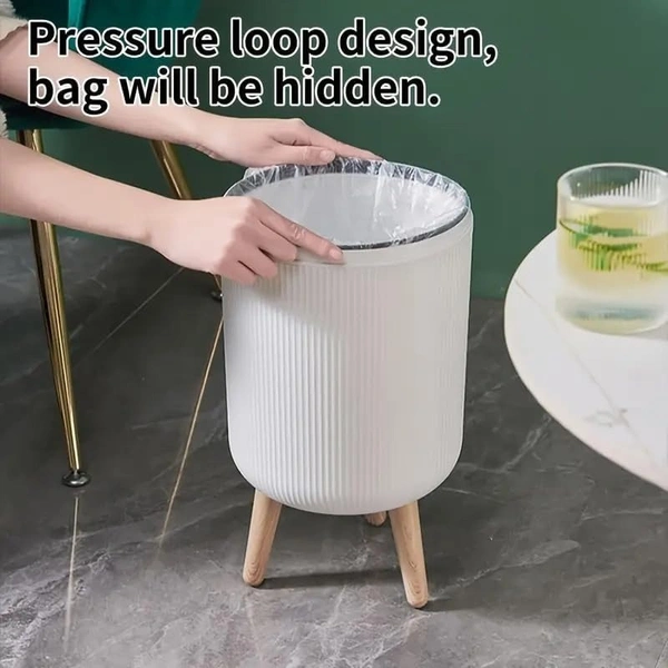 Stylish floor-standing dustbin with modern ribbed design, Plastic legs, and a flip-top lid. Perfect for kitchens, living rooms, and offices, offering functionality with elegant décor.