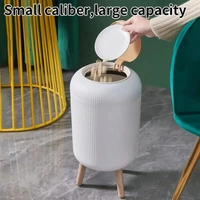 Stylish floor-standing dustbin with modern ribbed design, Plastic legs, and a flip-top lid. Perfect for kitchens, living rooms, and offices, offering functionality with elegant décor.