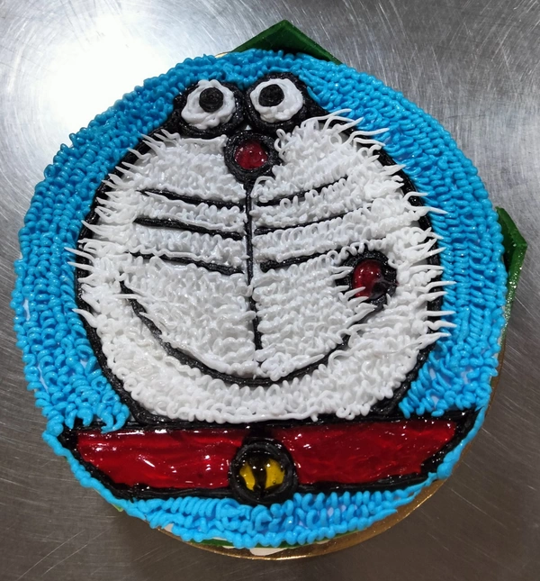 Eggless Doraemon Pineapple Cake Half Kg 