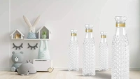 (Pack Of 4 Crystal Clear Plastic Fridge Water Bottle Set of 4 1 litre, Ideal for Restaurant, Kitchen, Home, Office, Sports, School, Travelling (DIAMOND BOTTLE)