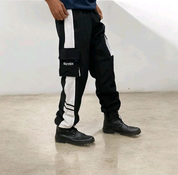 The Parachute Baggy Lower pants are a versatile and practical choice for casual wear - L