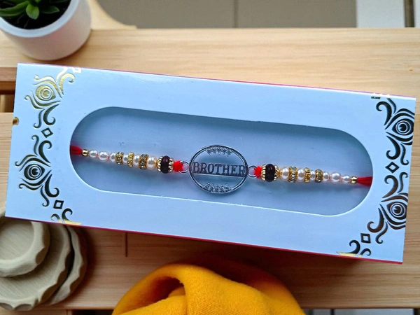 Silver Fancy Rakhi - Free Size