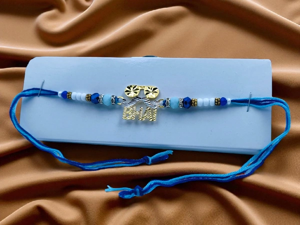 Silver Fancy Rakhi - Free Size