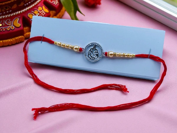 Silver Fancy Rakhi - Free Size