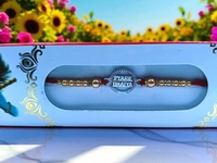 Silver Fancy Rakhi - Free Size