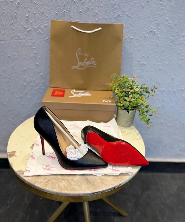 CHRISTIAN LOUBOUTIN RED SOLE LEATHER HEELS 