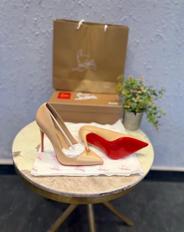 CHRISTIAN LOUBOUTIN RED SOLE LEATHER HEELS 