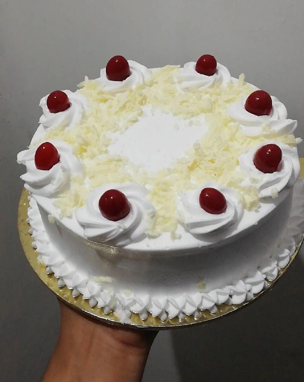 White Forest Cake With Cherry Topping