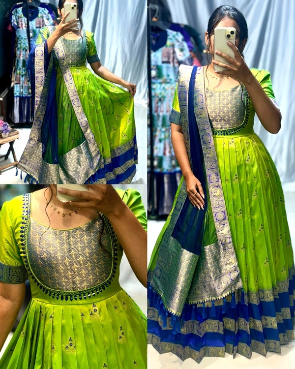 Trendy silk gown, crafted with banarasi silk and golden zari weave.paired with net duppta with zari border and decorated with mirror and work - XS