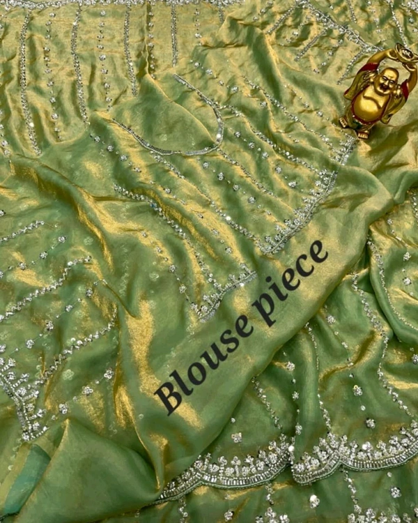 High Trending Presenting you the luxurious and glamorous hand work saree
 - Green, Free Size