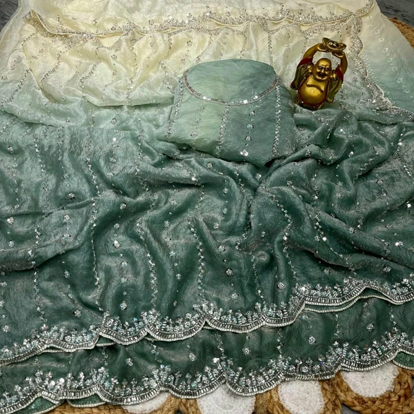 High Trending Presenting you the luxurious and glamorous hand work saree - Teal, Free Size