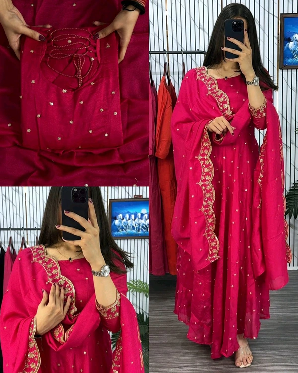Introducing our Striking Vichitra Anarkali Adorned with Exquisite Embroidery. Paired with a delicate Border dupatta, this ensemble exudes elegance and sophistication, perfect for any special occasion - Burgundy, S