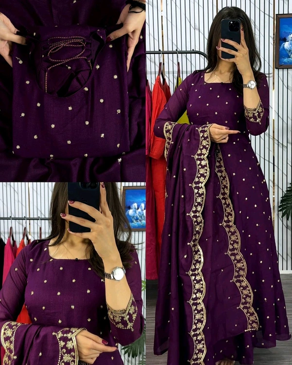 Introducing our Striking Vichitra Anarkali Adorned with Exquisite Embroidery. Paired with a delicate Border dupatta, this ensemble exudes elegance and sophistication, perfect for any special occasion - Ripe Plum, 2XL