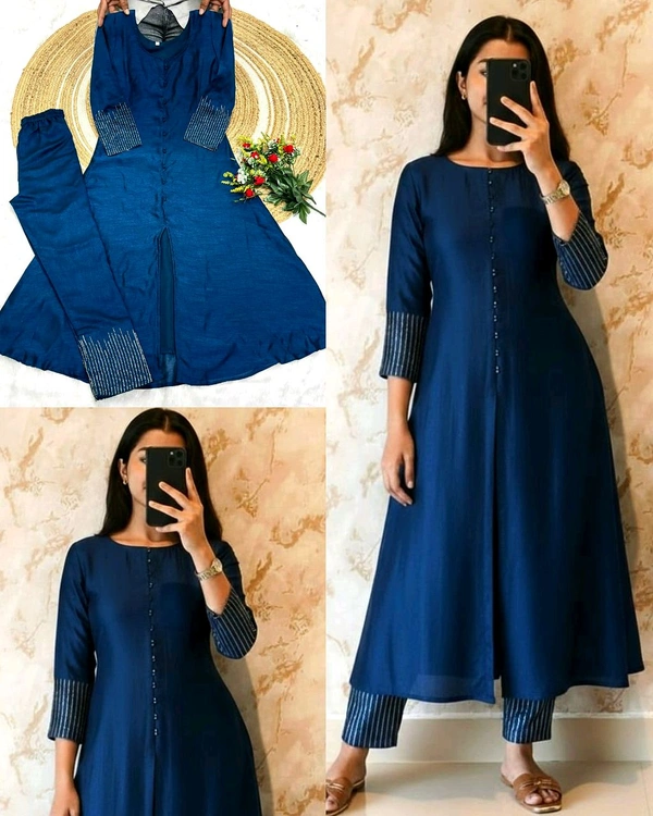 Crafted in luxurious blooming this elegant A-line kurta set is adorned with beautiful sleeve and pant handwork this work highlight rich look of the outfit - XL, Jungle Mist