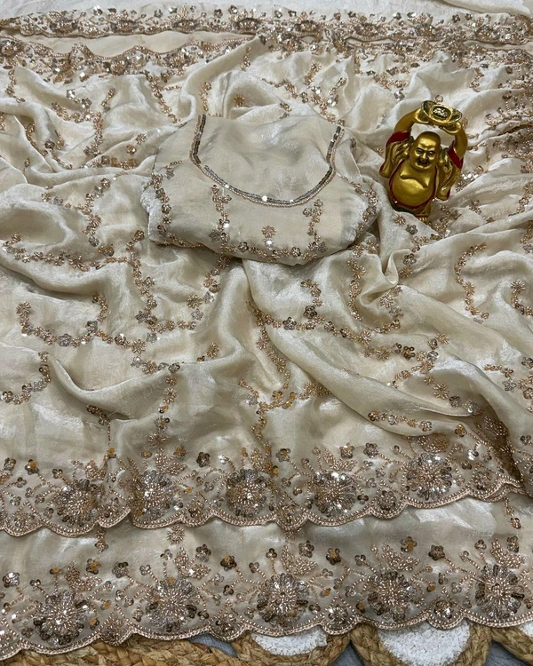 Launch Grand party wear saree in original gold beeds work