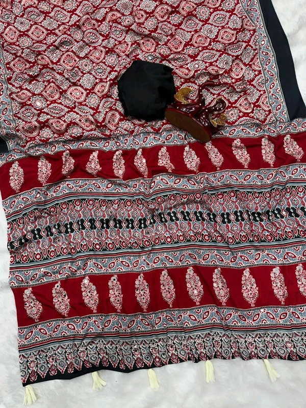 Most exclusive demand Beautiful Ajarakh print with Real mirror work saree with beautiful tussle