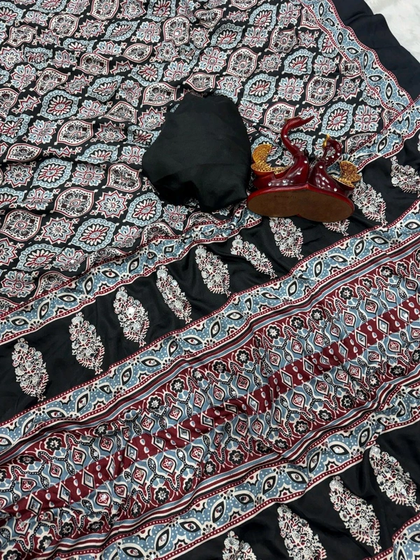 Most exclusive demand Beautiful Ajarakh print with Real mirror work saree with beautiful tussle