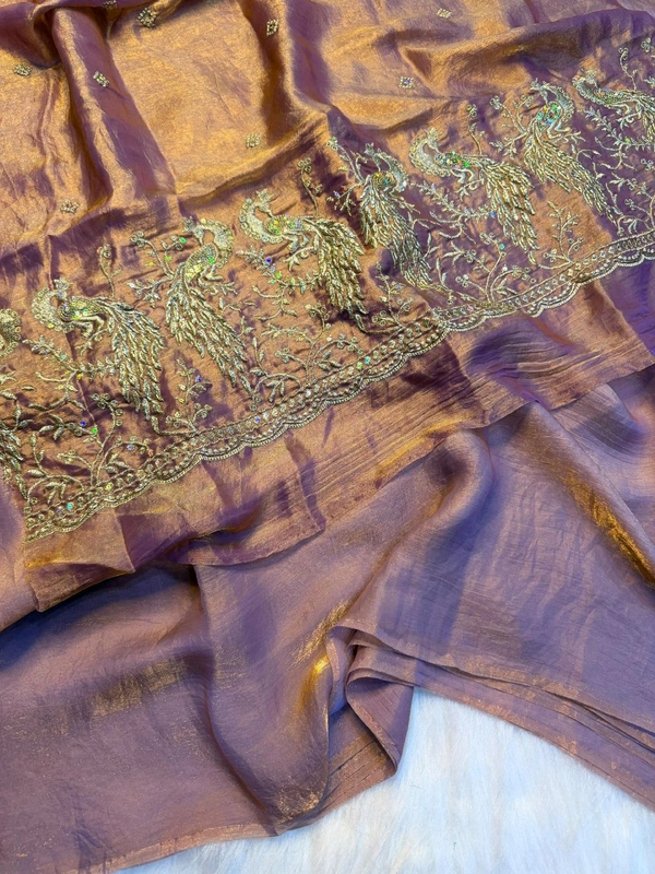 These outfits are stunning! The intricate peacock embroidery paired with that vibrant color palette is a total showstopper Premium space silk saree with work Blouse ✨ 