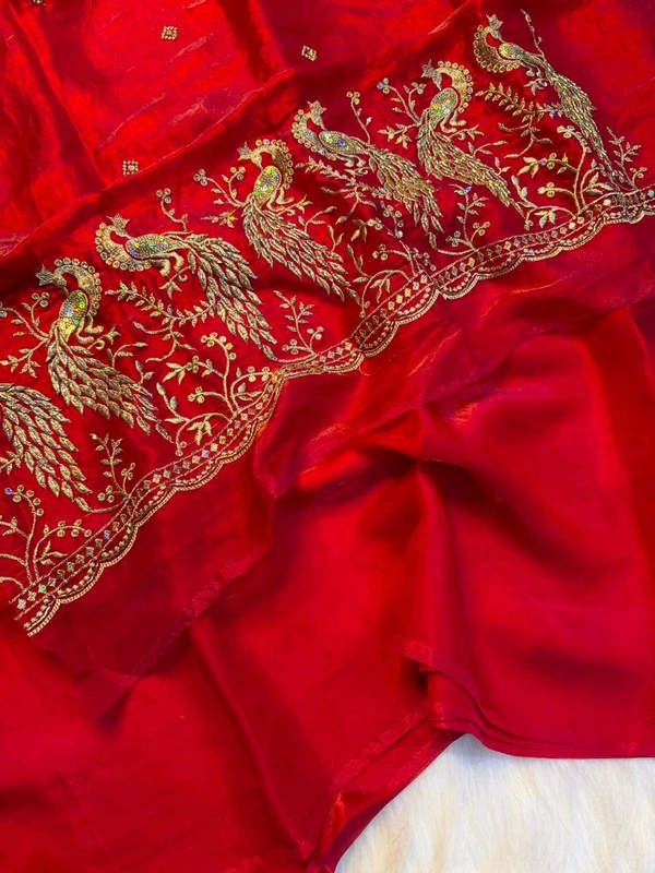 These outfits are stunning! The intricate peacock embroidery paired with that vibrant color palette is a total showstopper Premium space silk saree with work Blouse ✨ 