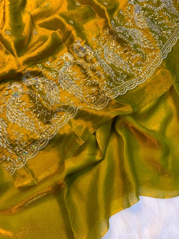 These outfits are stunning! The intricate peacock embroidery paired with that vibrant color palette is a total showstopper Premium space silk saree with work Blouse ✨ 