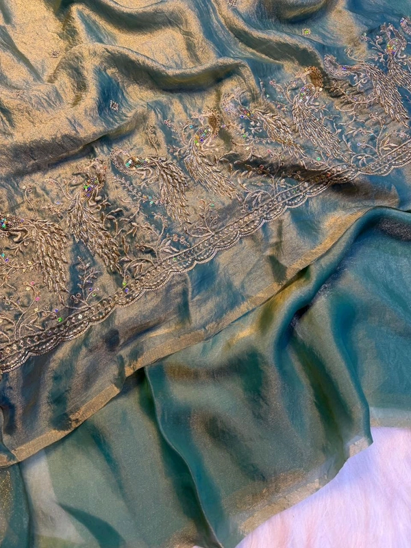 These outfits are stunning! The intricate peacock embroidery paired with that vibrant color palette is a total showstopper Premium space silk saree with work Blouse ✨ 