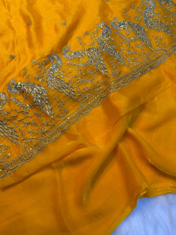 These outfits are stunning! The intricate peacock embroidery paired with that vibrant color palette is a total showstopper Premium space silk saree with work Blouse ✨ 