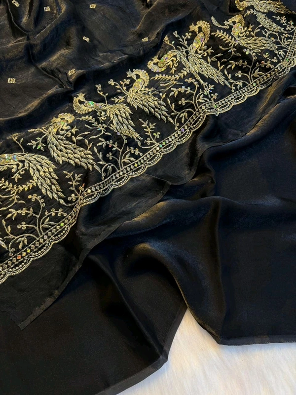 These outfits are stunning! The intricate peacock embroidery paired with that vibrant color palette is a total showstopper Premium space silk saree with work Blouse ✨ 