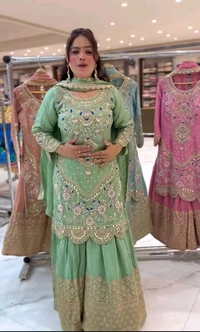 Stylish Heavy Work Teal Green Color Sharara Suit
- Pista, M