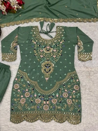 Stylish Heavy Work Teal Green Color Sharara Suit
- Pista, M