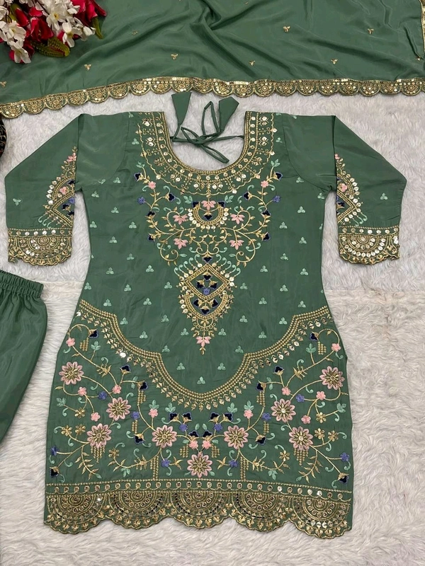 Stylish Heavy Work Teal Green Color Sharara Suit
- Pista, M