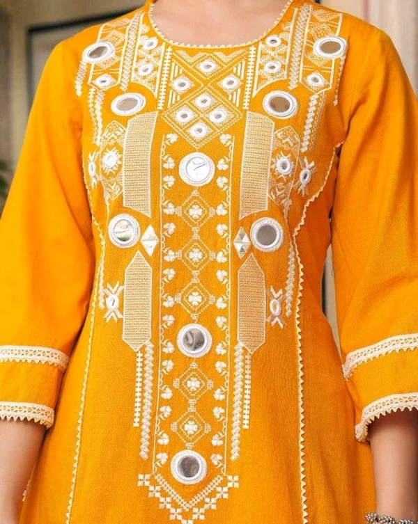 Black Elegant Reyon Cotton Top & Plazo Set with Real Mirror Work and Fancy Lace Latkan
- L, Yellow