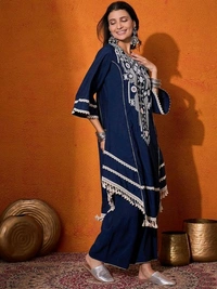 Black Elegant Reyon Cotton Top & Plazo Set with Real Mirror Work and Fancy Lace Latkan
- L, Blue
