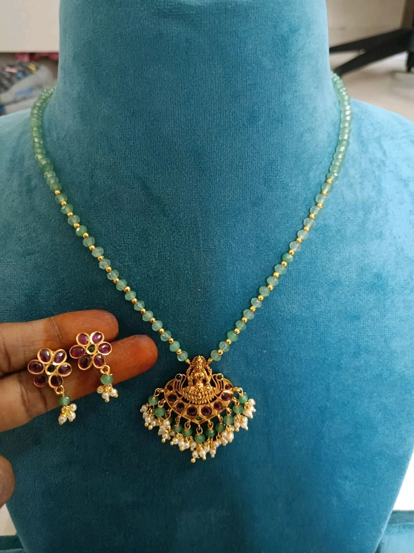 Cz's With Laxmi Pendant And Earrings 