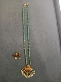 Cz's With Laxmi Pendant And Earrings 