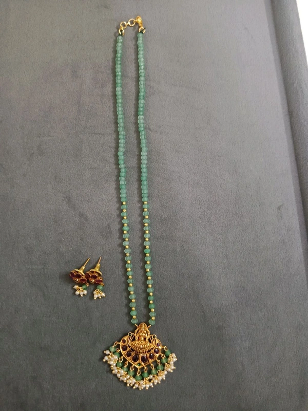Cz's With Laxmi Pendant And Earrings 
