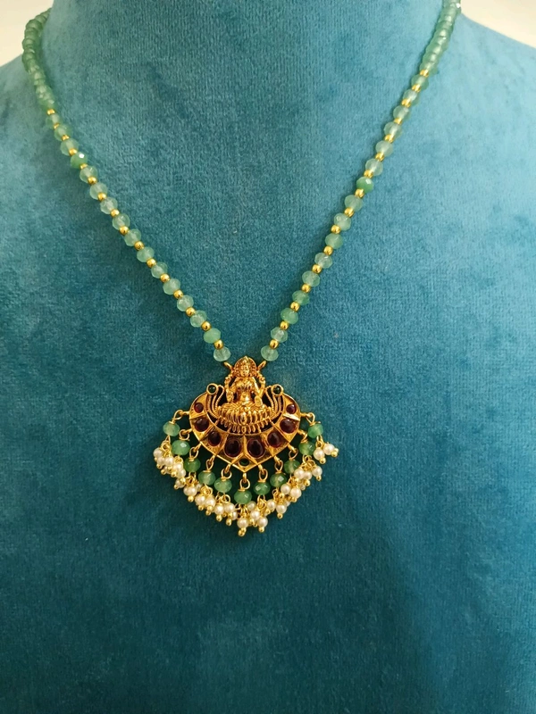 Cz's With Laxmi Pendant And Earrings 