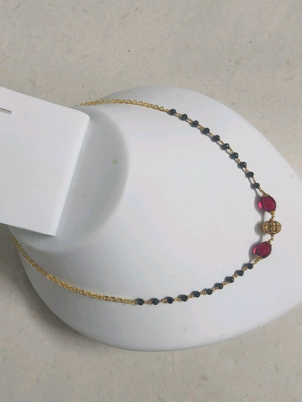 Black Cz's With Red Mani